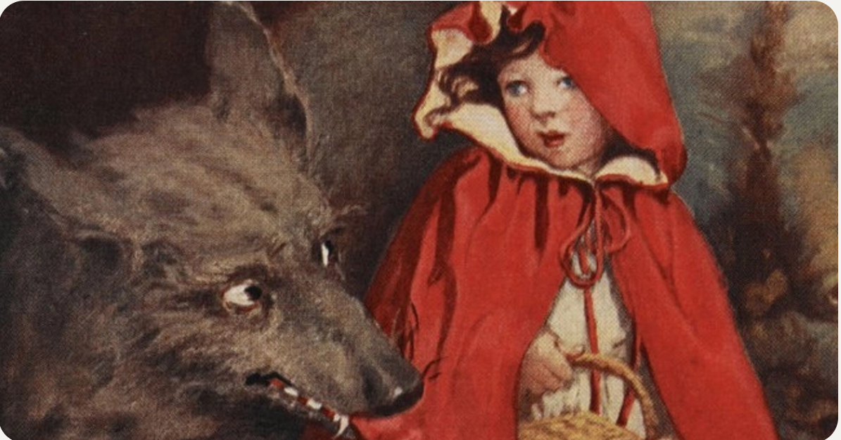 Image of little red rifing hood and a wolf.