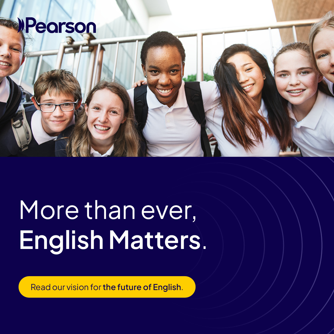 A group of smiling school pupils.