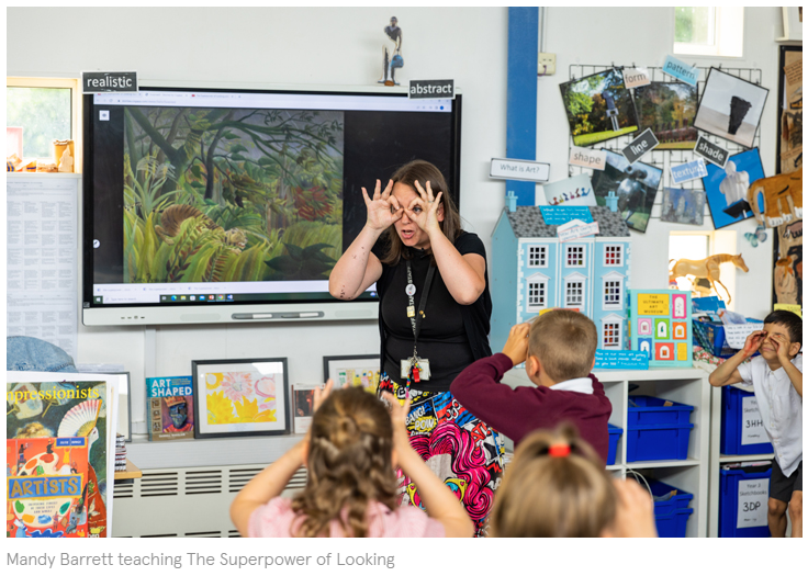 Teacher in a classroom teaching the superpower of looking