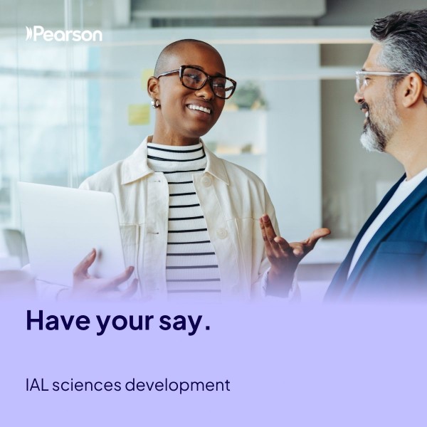 Smiling woman holding papers talks to man - heading reads 'have your say - IAL sciences development'.