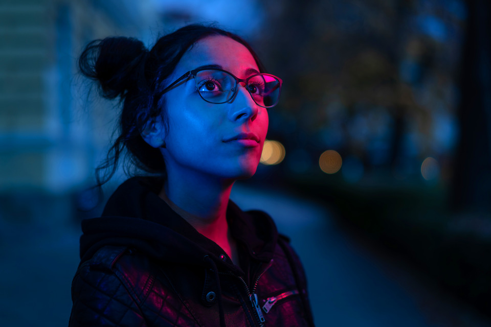 Girl in glasses looking up