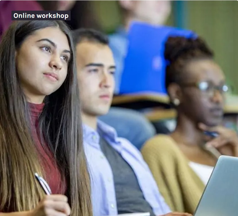 Students sitting in a lecture theatre.